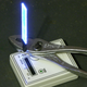 Illustration for article titled Turn Your Broken CD Case Shards Into Mini LED Light Sabers For Your Wall